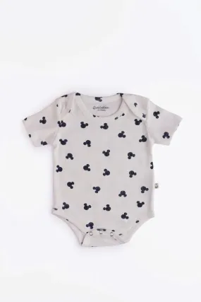 Half sleeve mickey mouse pattern in white bodysuit for baby