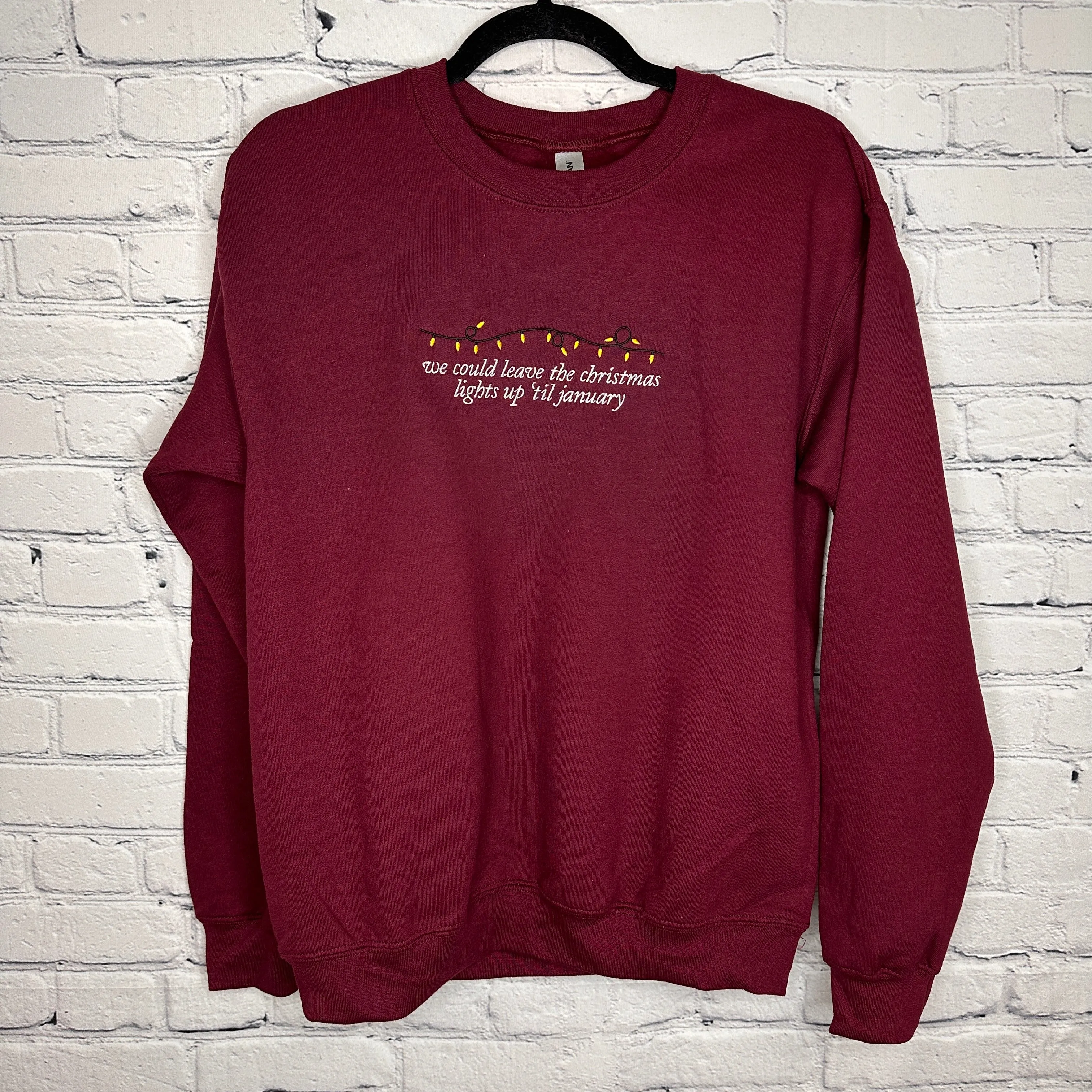 Lights Up 'Til January on Maroon Gildan Heavy Blend Sweatshirt