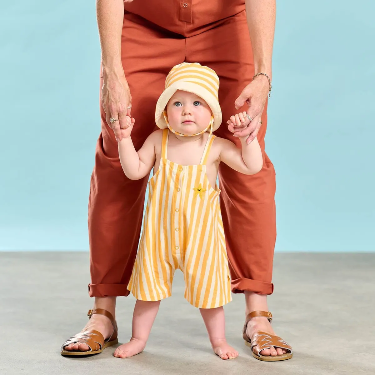 The Bonnie Mob Kids Cayman Striped Dungaree Romper in Orange